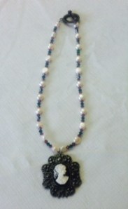 Cameo pendant with accent beads